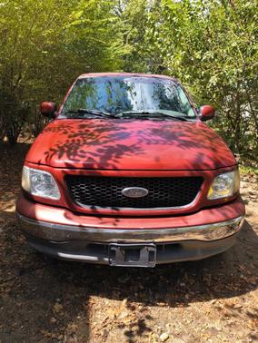 Red 2002 Ford F-150 Lariat SuperCrew
