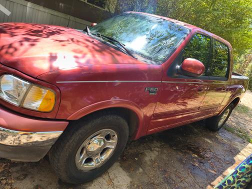 Red 2002 Ford F-150 Lariat SuperCrew