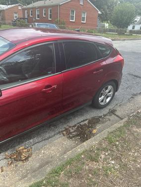 Red 2014 Ford Focus SE