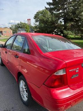 Red 2006 Ford Focus ZX4 SE