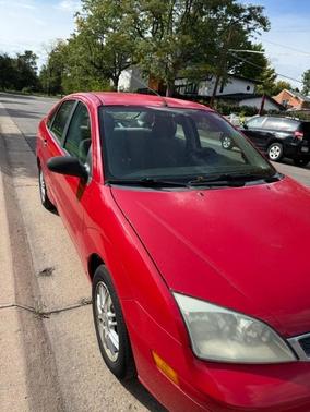 Red 2006 Ford Focus ZX4 SE