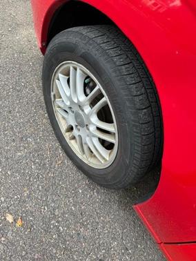 Red 2006 Ford Focus ZX4 SE