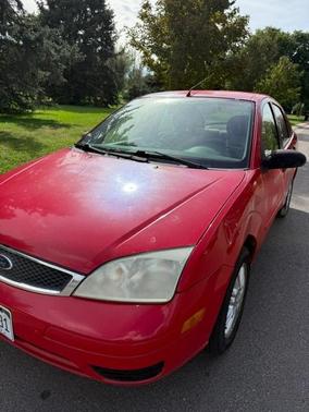Red 2006 Ford Focus ZX4 SE