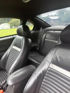 Red 2003 Ford Mustang Mach I