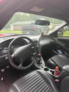 Red 2003 Ford Mustang Mach I
