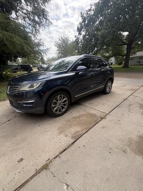 Blue 2015 Lincoln MKC Base