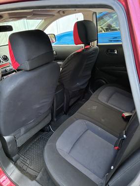 Red 2010 Nissan Rogue SL