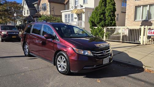 Red 2015 Honda Odyssey EX-L
