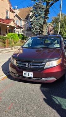 Red 2015 Honda Odyssey EX-L