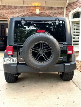 Black 2015 Jeep Wrangler Unlimited Sport