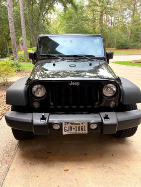 Black 2015 Jeep Wrangler Unlimited Sport