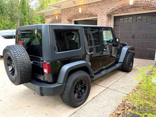 Black 2015 Jeep Wrangler Unlimited Sport