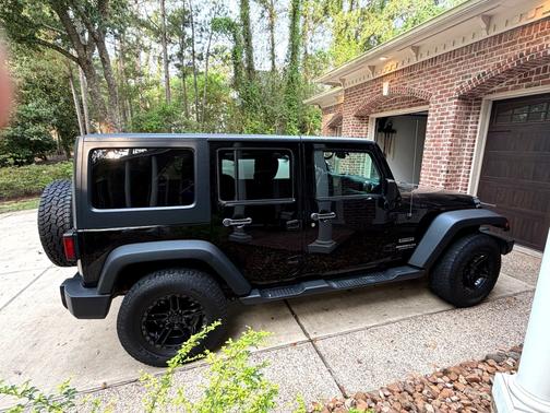 Black 2015 Jeep Wrangler Unlimited Sport
