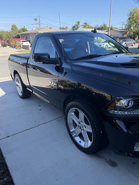 Black 2014 RAM 1500 Sport