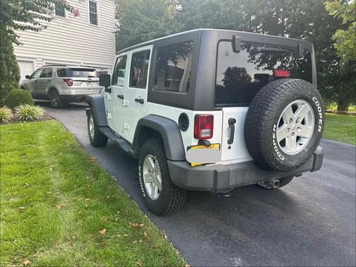 White 2017 Jeep Wrangler Unlimited Sport