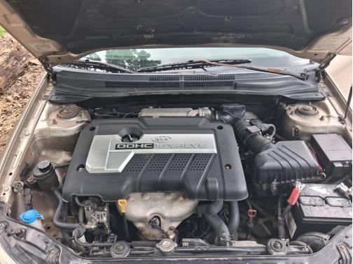 Gold 2005 Kia Spectra LX