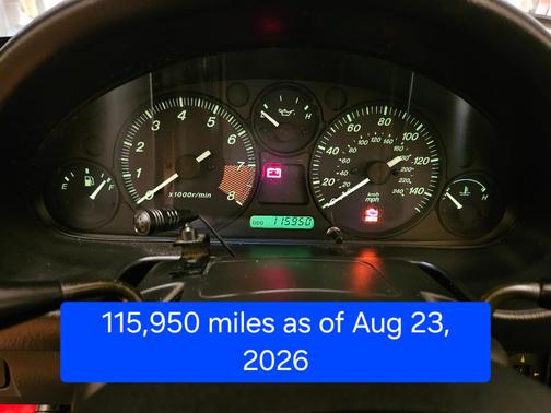 Red 2000 Mazda MX-5 Miata SE