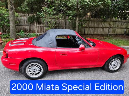 Red 2000 Mazda MX-5 Miata SE