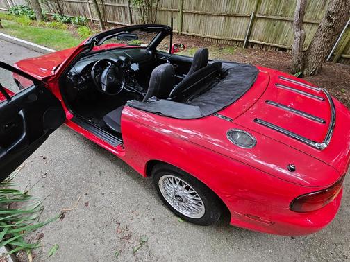 Red 2000 Mazda MX-5 Miata SE