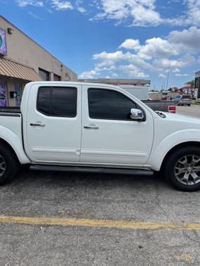 White 2019 Nissan Frontier SL