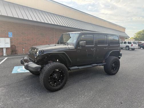 Black 2012 Jeep Wrangler Unlimited Altitude