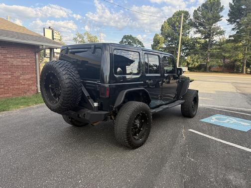 Black 2012 Jeep Wrangler Unlimited Altitude