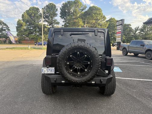Black 2012 Jeep Wrangler Unlimited Altitude
