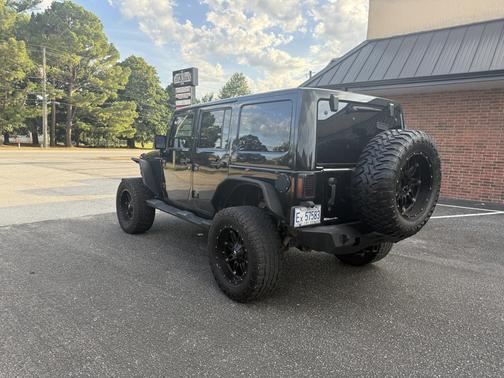 Black 2012 Jeep Wrangler Unlimited Altitude