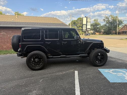 Black 2012 Jeep Wrangler Unlimited Altitude