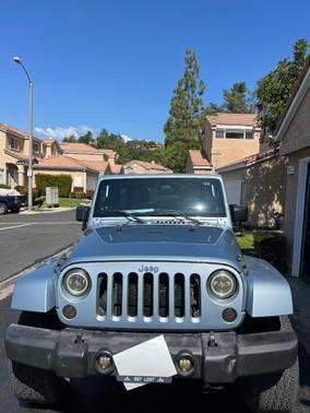 Blue 2012 Jeep Wrangler Unlimited Sport RHD