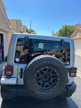 Blue 2012 Jeep Wrangler Unlimited Sport RHD