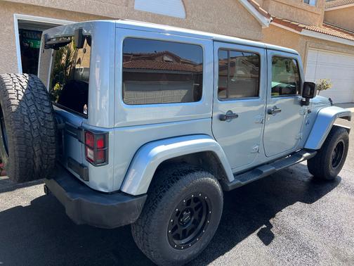 Blue 2012 Jeep Wrangler Unlimited Sport RHD