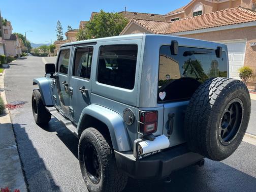 Blue 2012 Jeep Wrangler Unlimited Sport RHD