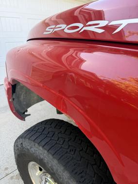 Red 2000 Dodge Ram 2500 Quad Cab