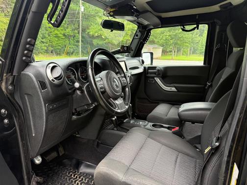 Black 2012 Jeep Wrangler Unlimited Rubicon