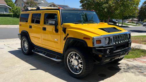 Yellow 2006 Hummer H2 Base