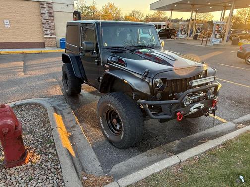 Black 2011 Jeep Wrangler Sport