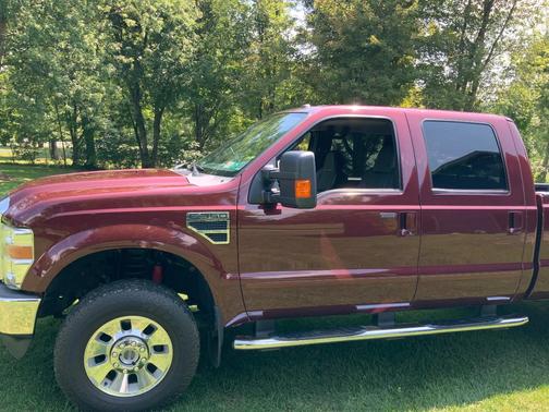 Red 2010 Ford F-350 Lariat Super Duty Crew Cab
