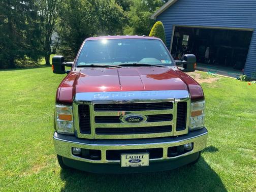 Red 2010 Ford F-350 Lariat Super Duty Crew Cab