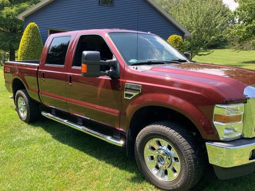 Red 2010 Ford F-350 Lariat Super Duty Crew Cab