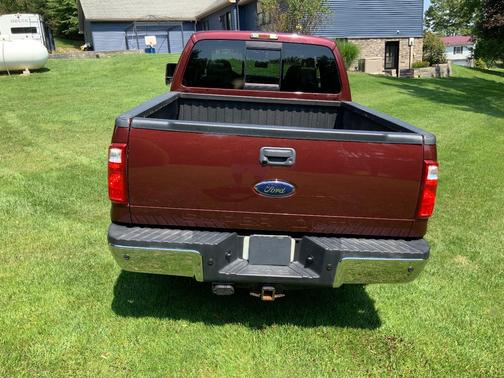 Red 2010 Ford F-350 Lariat Super Duty Crew Cab