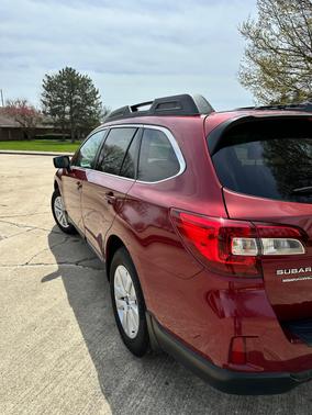 Red 2015 Subaru Outback 2.5i Premium