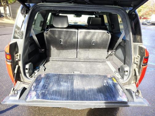 Red 2025 Rivian R1S Adventure Dual-Motor Standard Pack