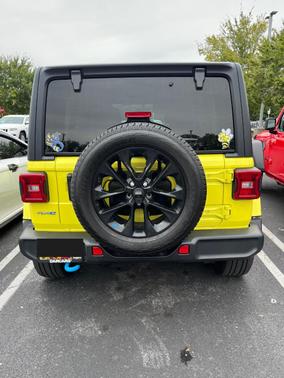 Yellow 2023 Jeep Wrangler 4xe Sahara