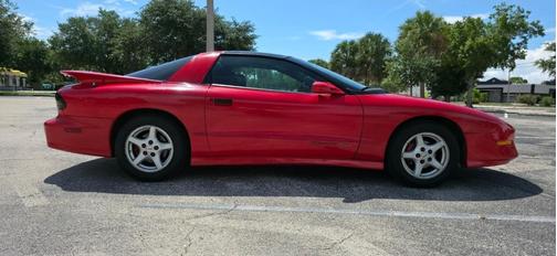 Red 1996 Pontiac Firebird Formula