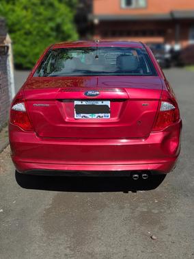 Red 2011 Ford Fusion SE