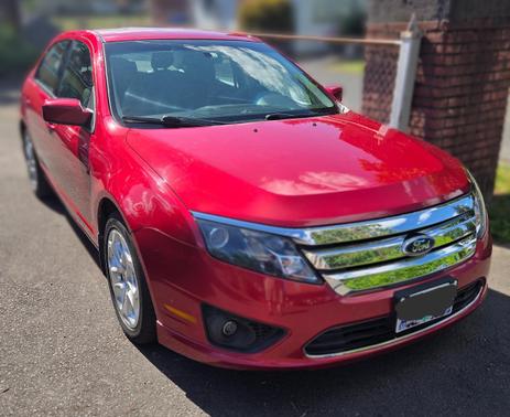Red 2011 Ford Fusion SE