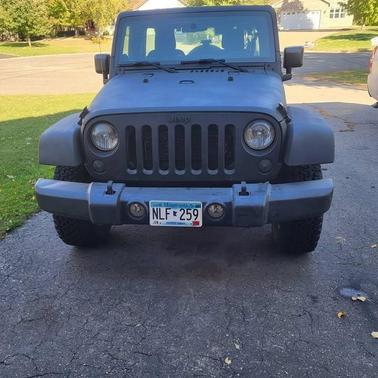 Black 2014 Jeep Wrangler Unlimited Sport