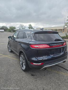 Blue 2015 Lincoln MKC Base