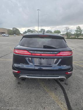 Blue 2015 Lincoln MKC Base